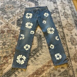 Stylish Blue Jeans with White Floral Accents